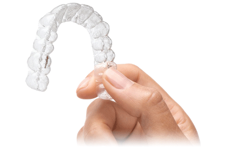 Imagen de una ortodoncia invisible, llamada Invisalign. Es uno de los muchos tratamientos que se realizan en la clínica dental Clínica Herrero en Valencia.
